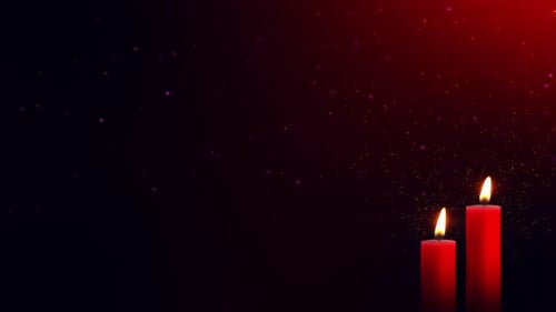 Warm Red Candles with Shimmering Particle Background Loop