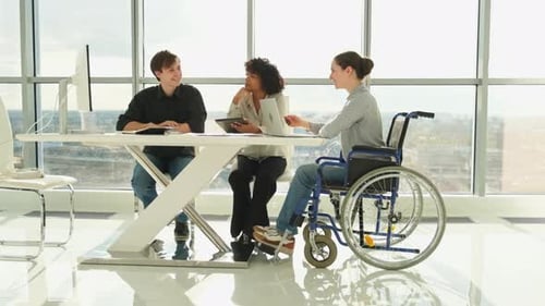 Team Meeting at Bright Modern Office Desk
