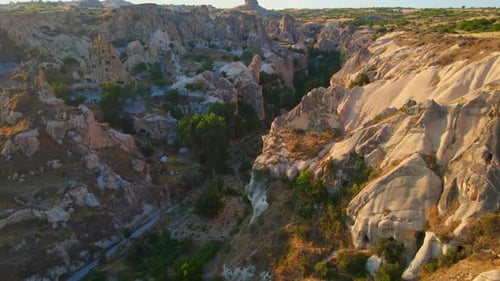 A Captivating Aerial Stock Video of the Cappadocia Region in Turkey Valleys with Houses Gracefully