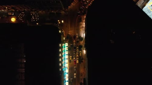 Athens city road at night aerial drone shot with many taxi