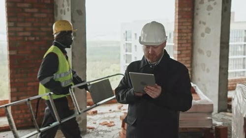 Men Working At Construction Site