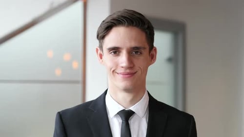 Shaking Head to Agree Young Businessman in Office