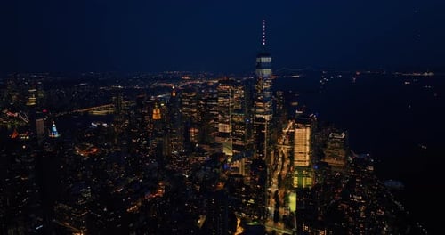 Multiple city lights of glamorous New York at night.