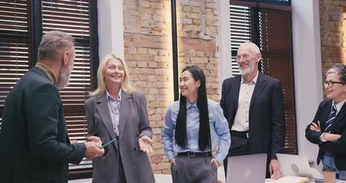 Diverse Business Team Meeting in Modern Office