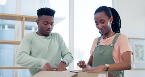 Couple, high five and packing box or moving house for real estate, relocation