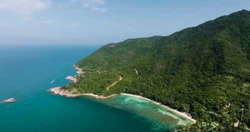 Tranquil Bay with Lush Hills and White Sand Beach Ko Pha Ngan Thailand