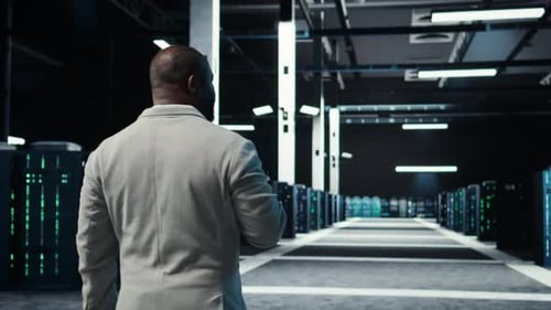 Server Room Software Developer Troubleshooting Errors Using Software