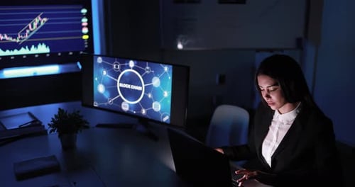 Young Trader Woman Working Inside Hedge Fund Office Doing Blockchain Research Analysis