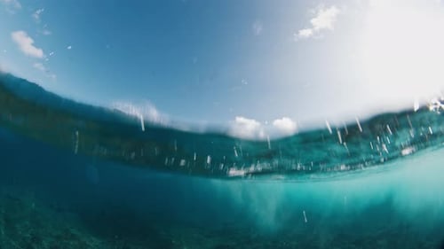 Woman Surfer Takes Off and Rides the Wave on a Surfboard in the Ocean Maldives