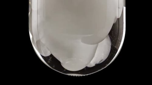 Substance Dissolving in Liquid Close Up