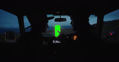 Tourists Holding Green Screen Smartphone While Traveling By Car