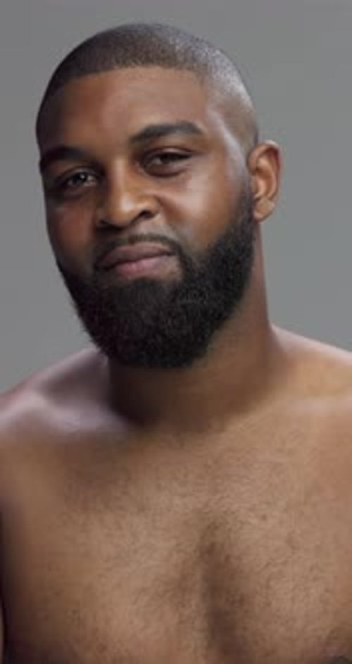 Studio, black man and face with wellness for skincare, grooming and beauty with cosmetics treatment