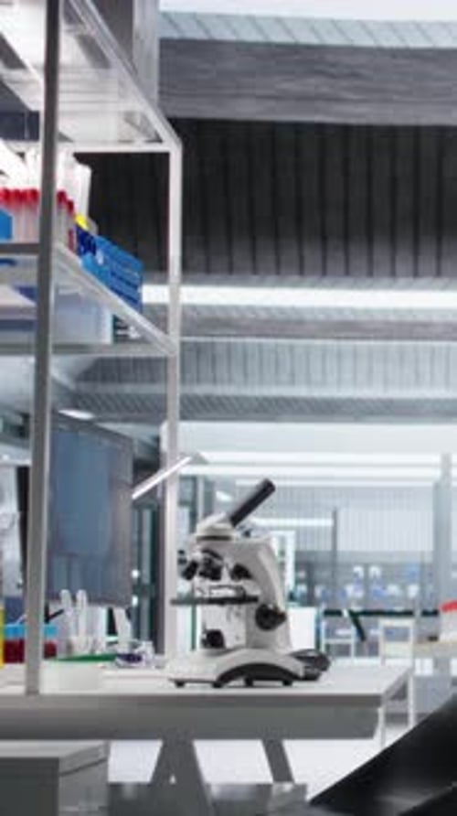 Microscope and Equipment in Modern Science Laboratory