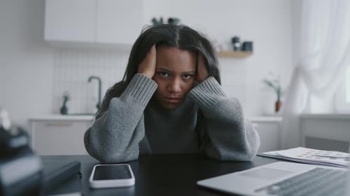 Frustrated and Exhausted Freelance at Home Office Portrait of Black Woman Female Worker or Student