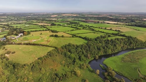 Boyne Valley with river and ancient monument. Knowth tomb and green landscape of Ireland.