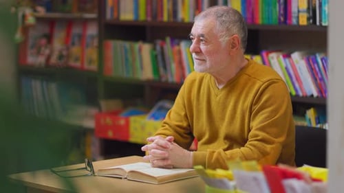 Literature Enthusiast Front View Portrait of Senior Man with Books