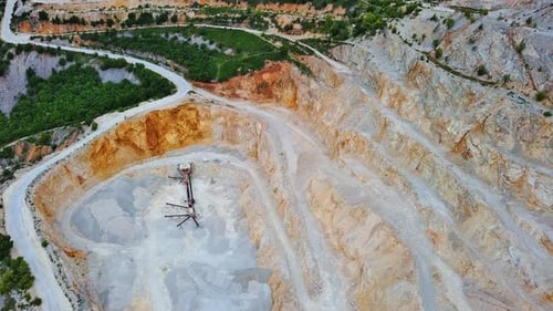 Natural Quarry is Located Near Road Against Backdrop of Rhodope Mountains and Hills with Forests and