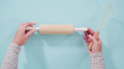 Baking Tools Preparation on Blue Background