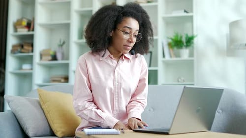Woman Video Call on Laptop at Home