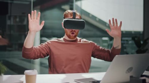 Futuristic Workflow Man Uses 3D Augmented Reality Glasses in Modern Office