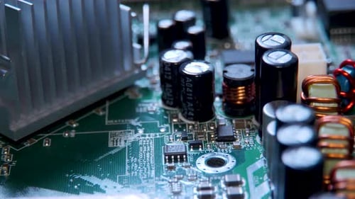 Computer Motherboard showing chips, transistors and circuits