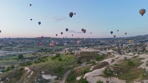 Breathtaking Hot Air Balloons Soaring Across Cappadocia's Scenic Sunrise Vista