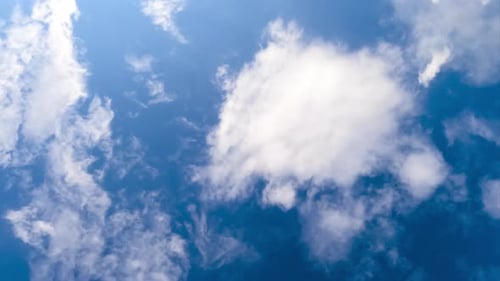 Time Lapse of White Clouds in a Blue Sky