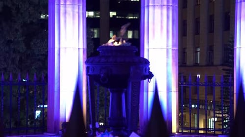 Shrine of remembrance and eternal flame burning at its heart, Anzac Square war memorial parklands at