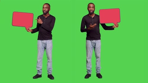 Man Holding Speech Bubble on Green Screen