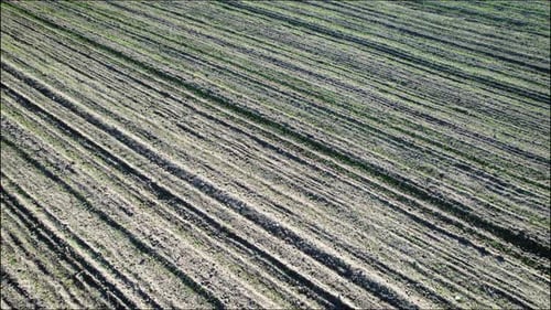 Aerial View of Tilled Soil on Farmland