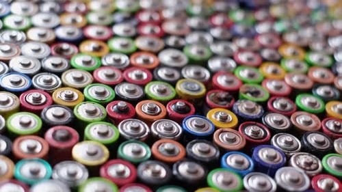Multi Colored Batteries Lined Up in Close Up