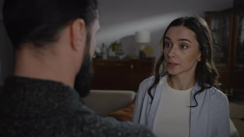 Distraught Woman Having Emotional Conversation