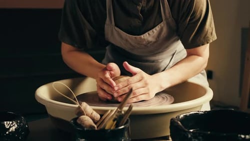 Woman Potter Works with Clay on Master Class in Studio Working Process in Ceramic Workshop Potter