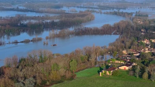 Aerial view of floodwaters engulfing fields, Sainte-Croix-du-Mont, France.