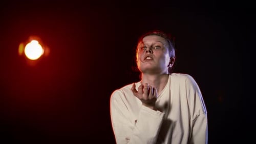 Actress Dancing on Theatrical Stage Contemporary Dance Performance in Theatre Medium Portrait Shot