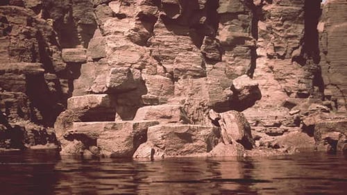 Beautiful Red River and Shores of Colored Sandstone