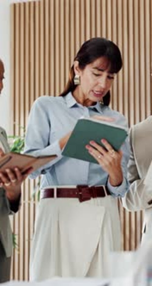 Investor, talking and business people in meeting, tablet for investment deal