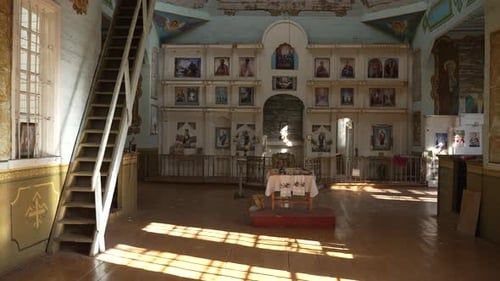 An Altar with Old Icons in an Abandoned Church
