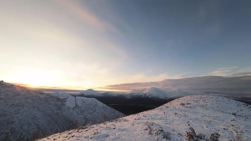 Snowy Mountain Range Landscape at Sunrise