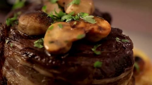 Close Up of Steak with Mushrooms and Parsley