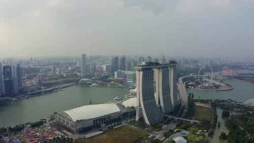 Drone Aerial view 4k Footage Of Singapore Skyscrapers With City. Corporate Offices Singapore.