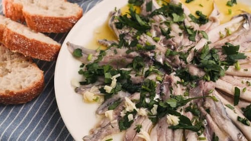Fresh Sea Sardines and Anchovy Fish and Mullus On Display On Ice On Market Store Shop Seafood Fish