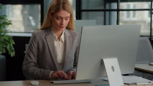 Caucasian Middleaged Woman in Office Working with Online Project Business Female Work in Internet