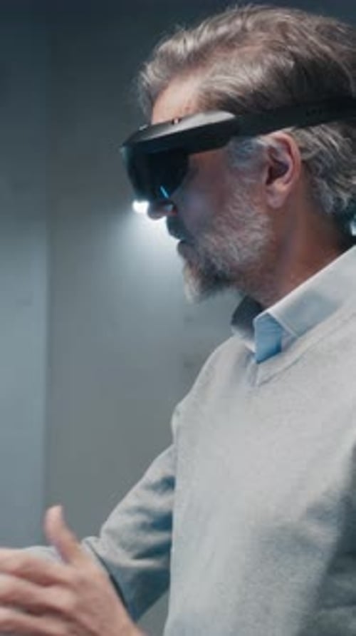 Engineers with VR Glasses Talk About Vehicle Production in High Tech Laboratory
