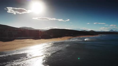 Seascape and mountain during sunset