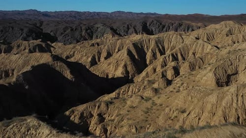 Cinematic drone shot of the rocky outcrops of the Charyn Canyon National Park in Kazakhstan