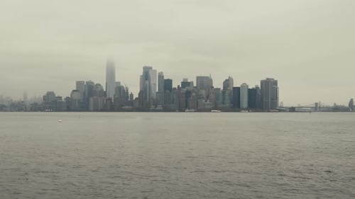 The Manhattan skyline on a cloudy overcast afternoon from the Hudson River