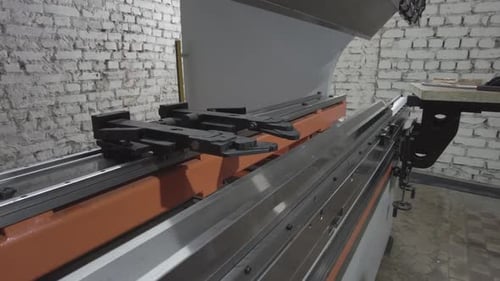 metal bending machine. metal bent. bending of metal. metal crafting