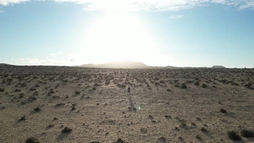 Aerial view of arid desert landscape under clear sky, Spain.