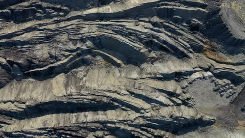 Old rock quarry plant with beautiful lines and colors in the rock.